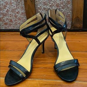 Black Nine West sandals with zip backs